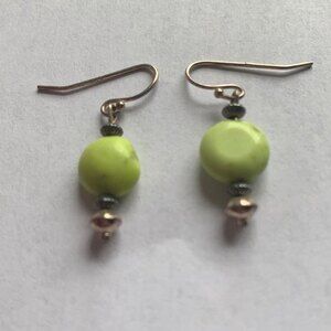 Green stone earrings dangling